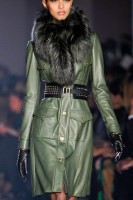 Jason Wu green leather dress, black studded gloves and fur scarf
