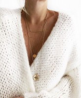 necklace layers white sweater
