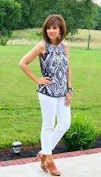 white jeans, navy and white print tank top and high heel sandals