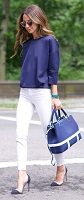 white jeans, three quarter length navy top and navy handbag