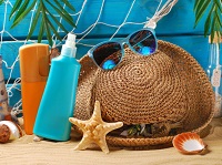 Beach bag essentials, beach bag sunscreen on the beach