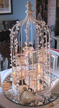 diner en blanc white birdcage with candles