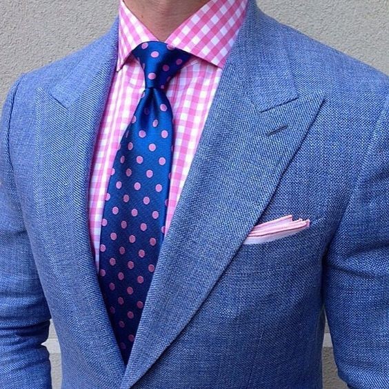 blue suit with pink shirt