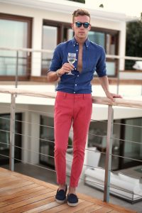 spring color trends 2017, men's blue button down shirt with red pants and navy shoes