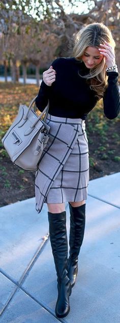 Boots at the Office, plaid skirt, black over the knee boots and black top, winter officewear