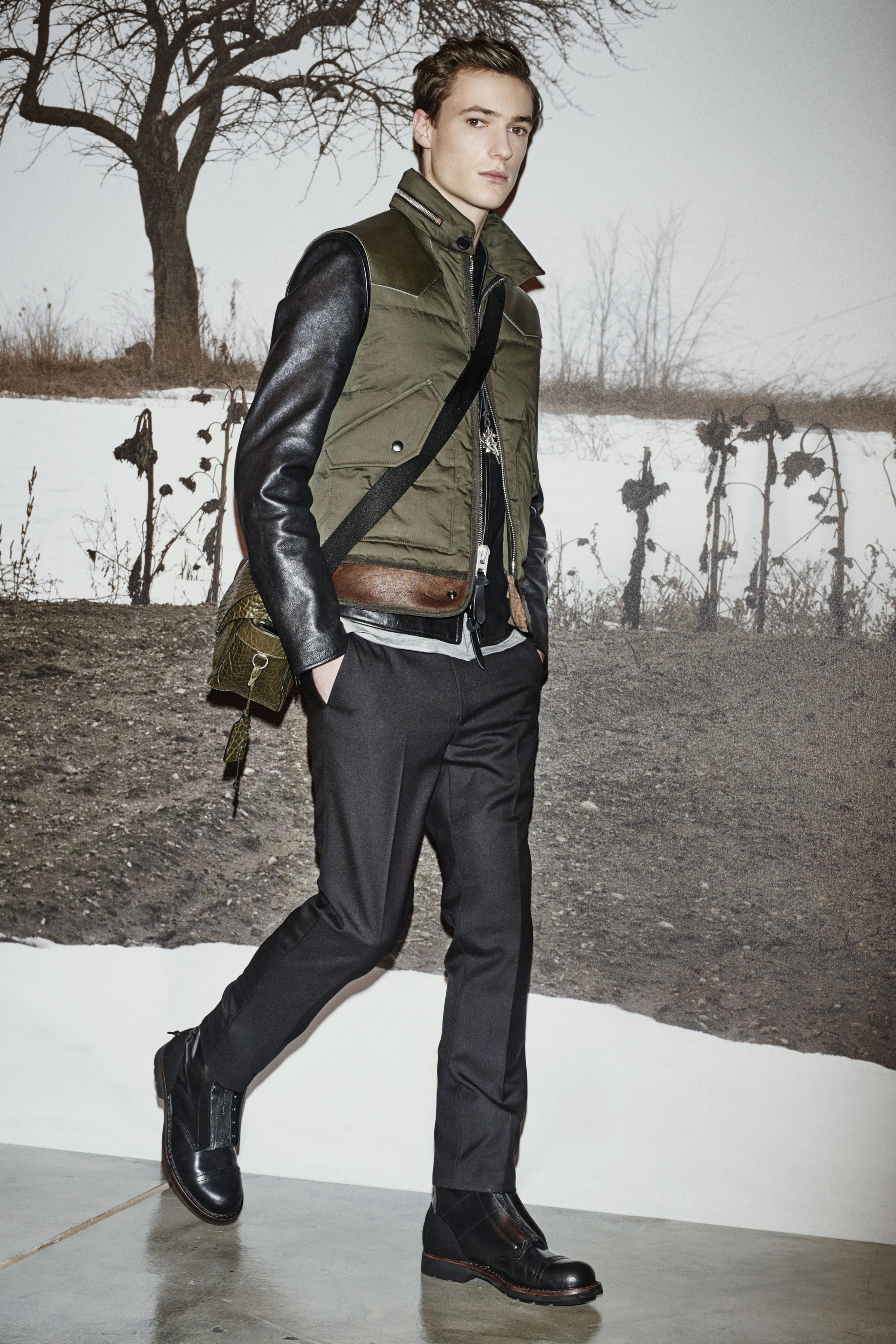 men's night on the town, military down bomber vest, and black leather jeacket with gray trousers