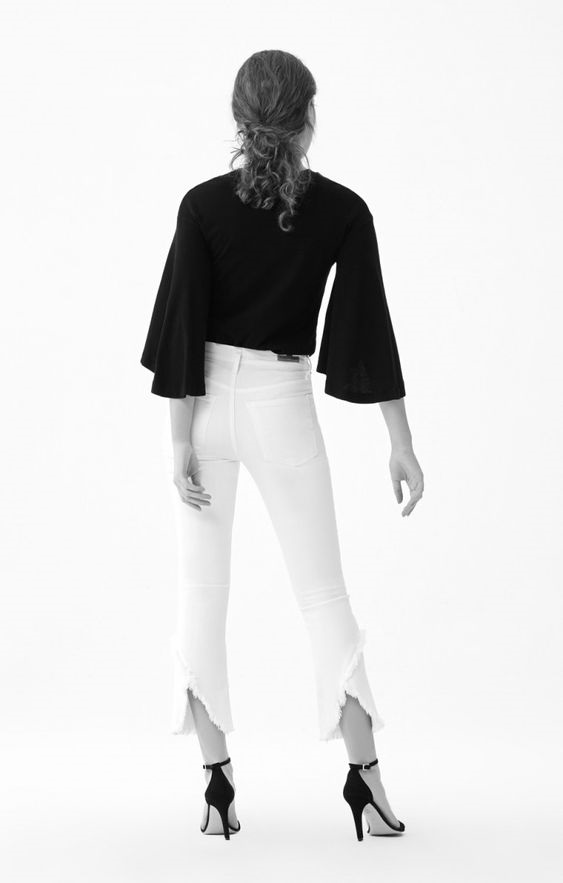 spring's white denim trends, tulip hem jeans, white citizens of humanity drew flare fray jeans with black flare blouse