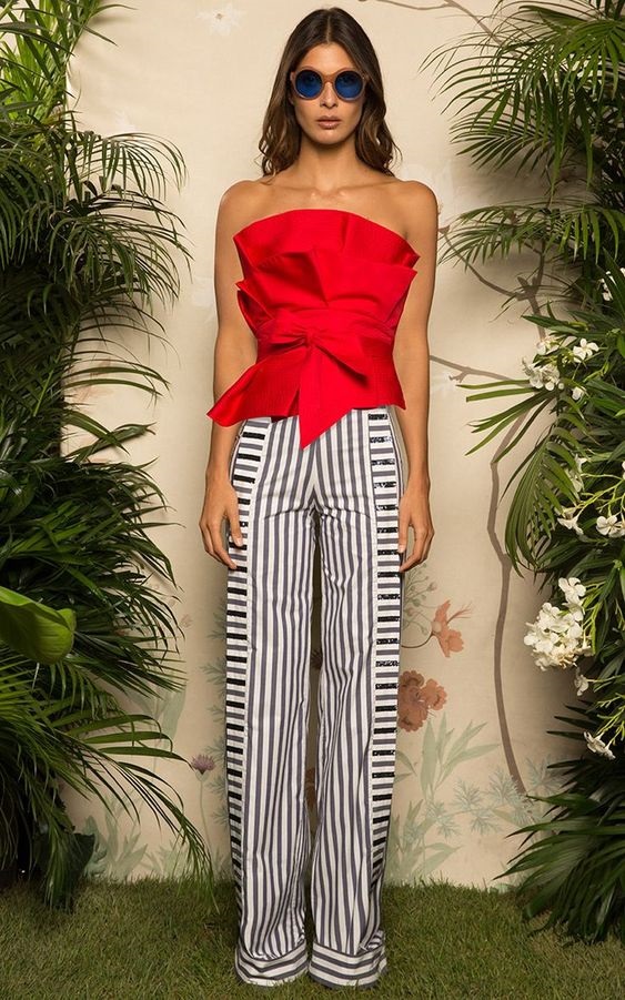 Red, White, and Beautiful Fourth of July outfits, party outfit, navy and white  striped pants with red bow tie strapless top and blue sunglasses-min |  Divine Style