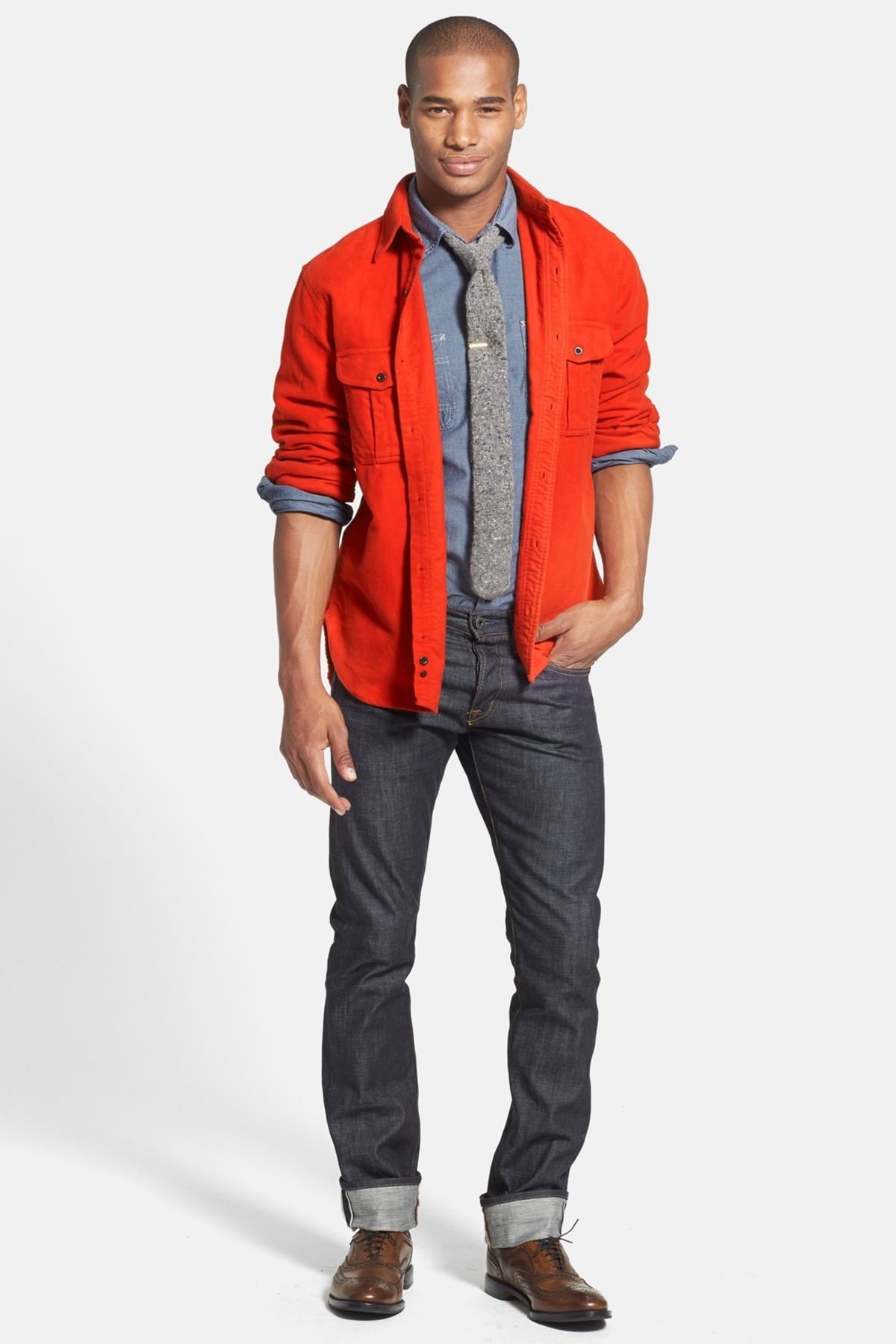 The Style Essentials You Need Men, trendy shirt, men's chambray shirt with orange shirt layered on top and jeans