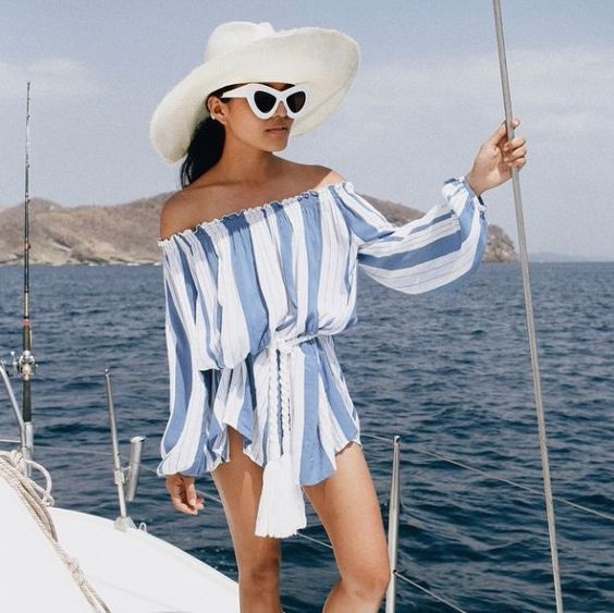 Beach Bag Beauty Essentials, blue and white striped coverup, white hat, white sunglasses