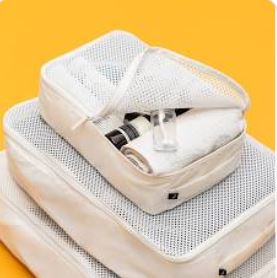Favorite Travel Accessories to Stay Organized, packing cubes, JULY white packing cubes